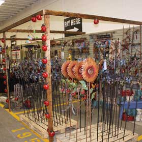 Four Seasons Decor & More has lawn and garden items at the Walnut Creek Amish Flea Market in Ohio